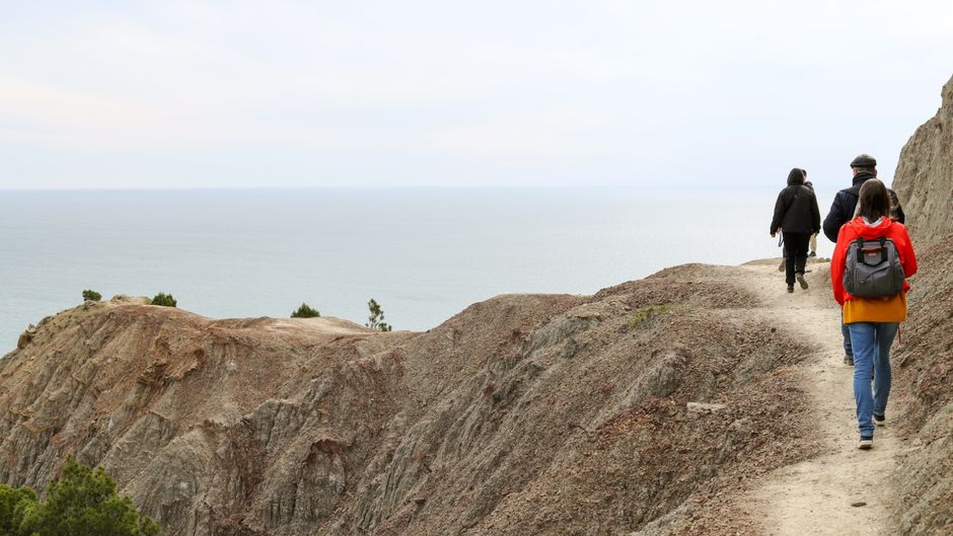 hiking boots coastal path narrow trail steep cliff