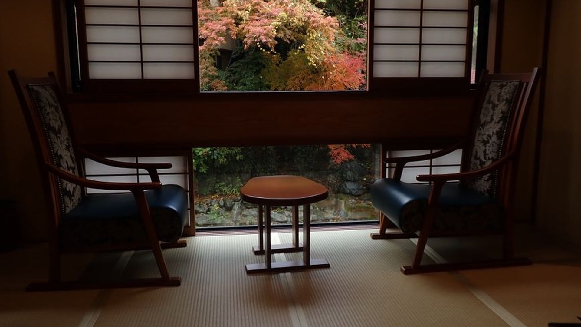 Kyoto ryokan wooden interior tatami mats futon sle