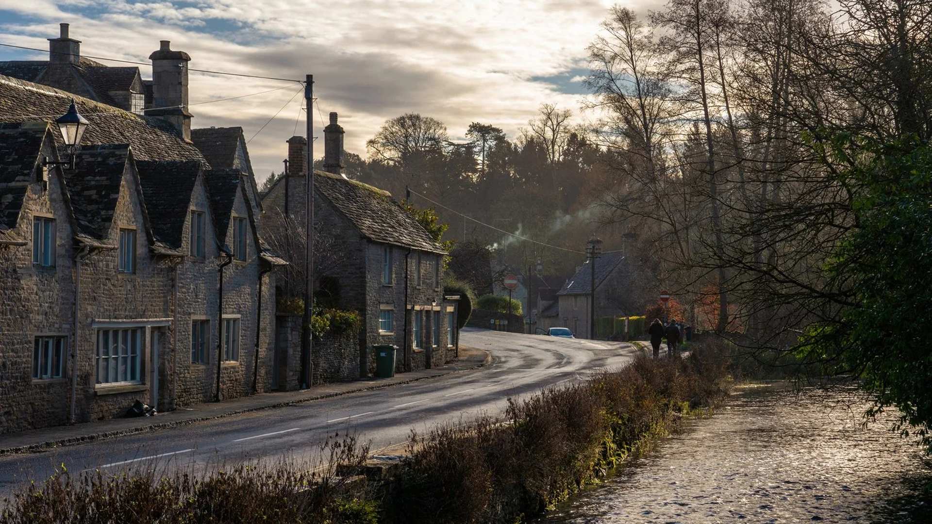 Bibury village early morning mist cobblestone stre